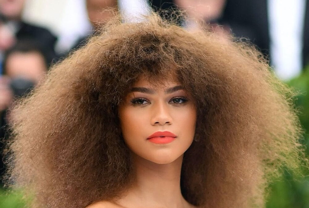 21 Curly Bangs Hairstyle Ideas as Seen on Celebrities